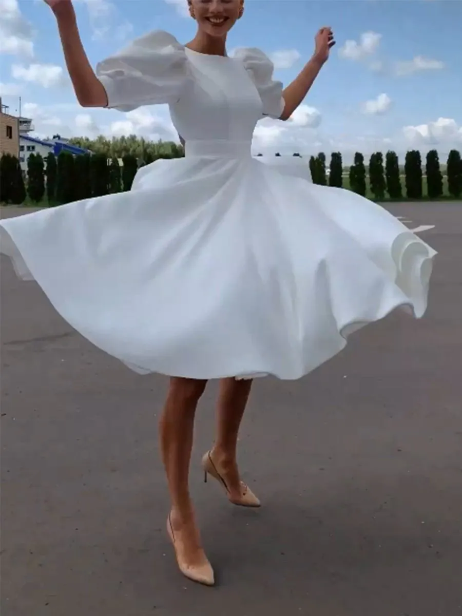 White Dress with Hollow Back Design